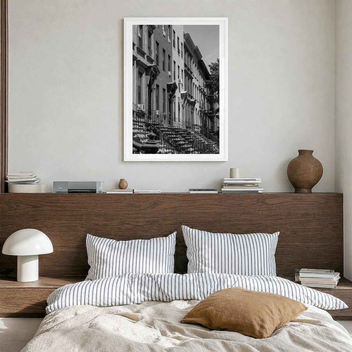 Bedford-Stuyvesant Photo Poster in a white wood frame, hanging in a bedroom, white border