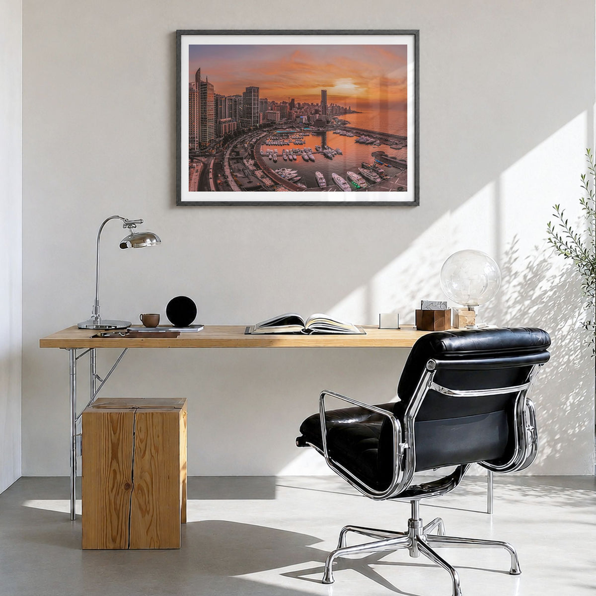 Beirut Photo Poster in a black wood frame, hanging in a bright home office, white border