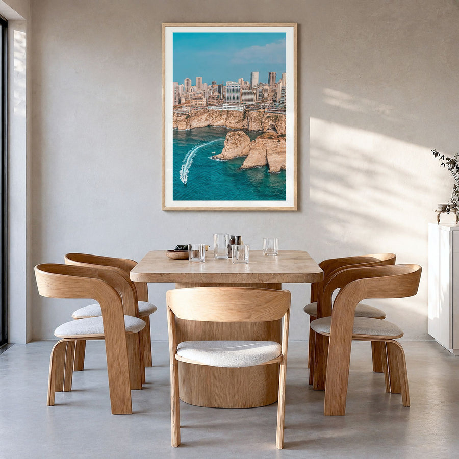 Beirut Photo Poster in a natural wood frame, hanging in a dining room, white border