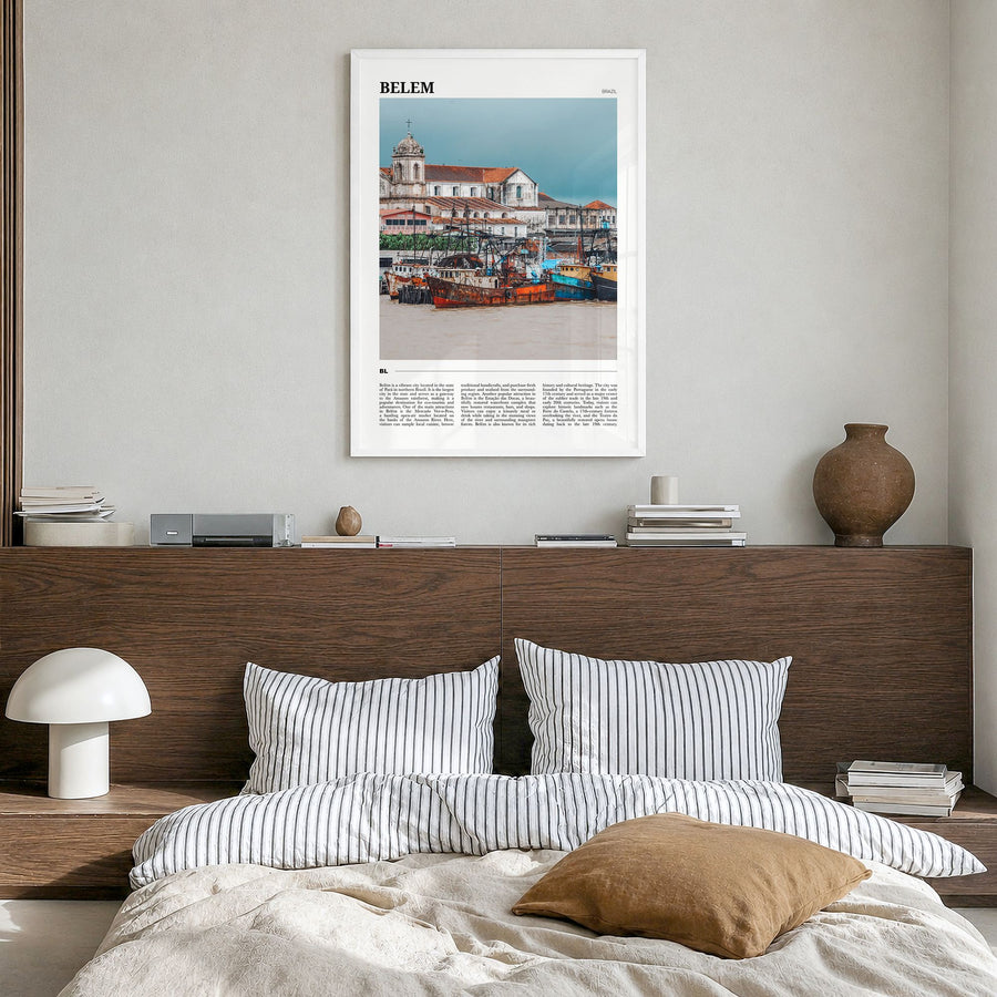 Belém Travel Poster in a white wood frame, hanging in a bedroom