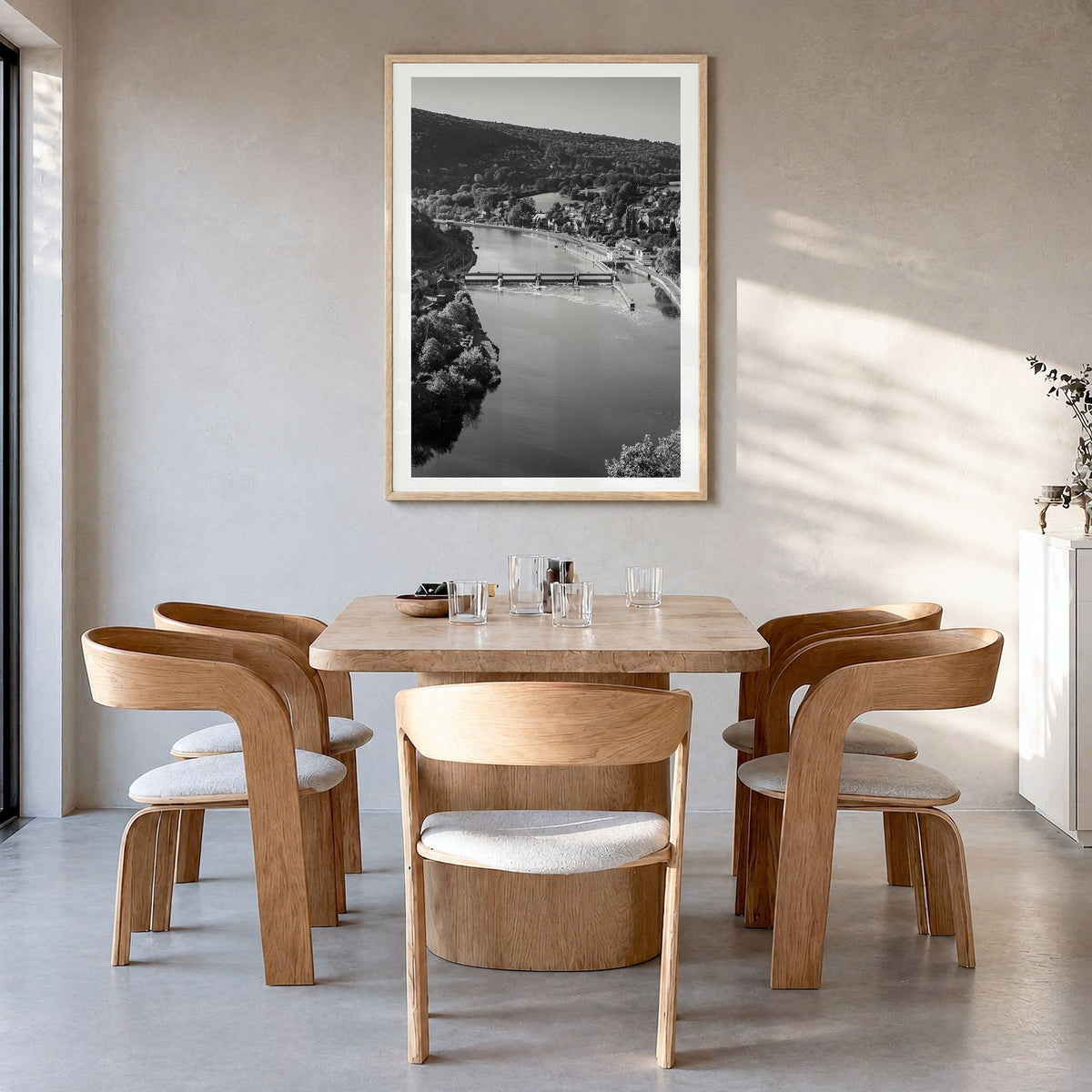 Belgium Photo Poster in a natural wood frame, hanging in a dining room, white border