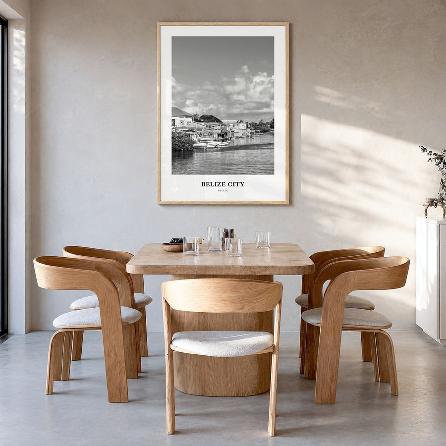 Belize City Classic Poster in a natural wood frame, hanging in a dining room