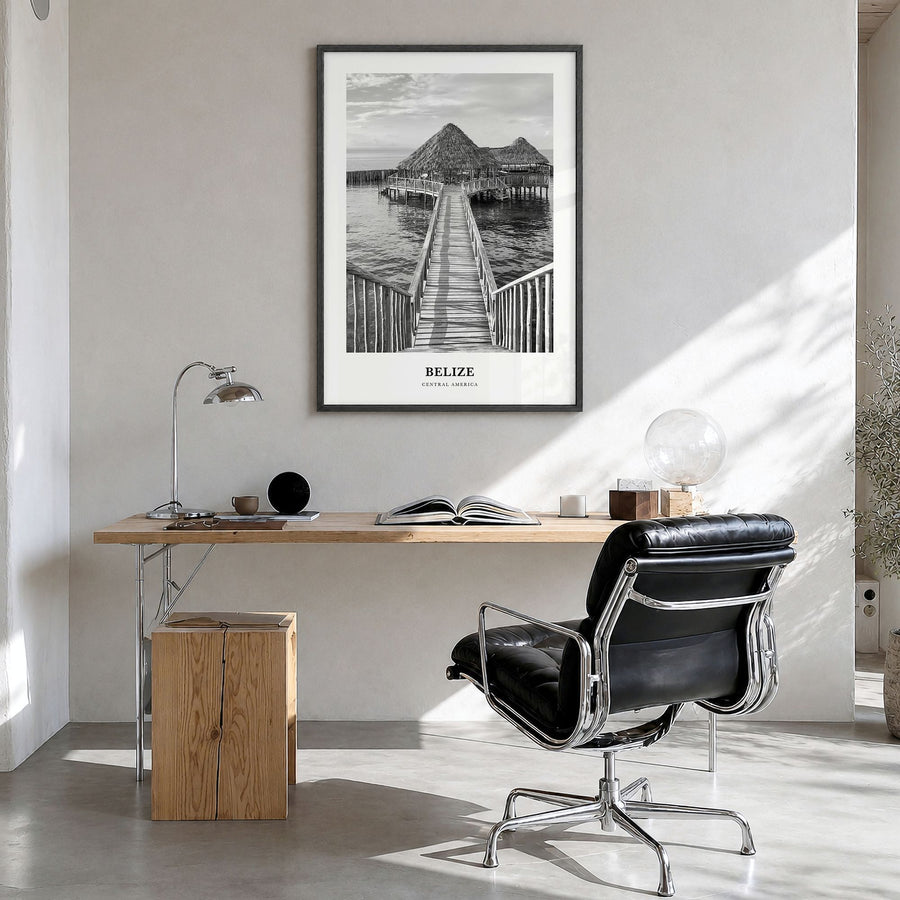 Belize Classic Poster in a black wood frame, hanging in a bright home office