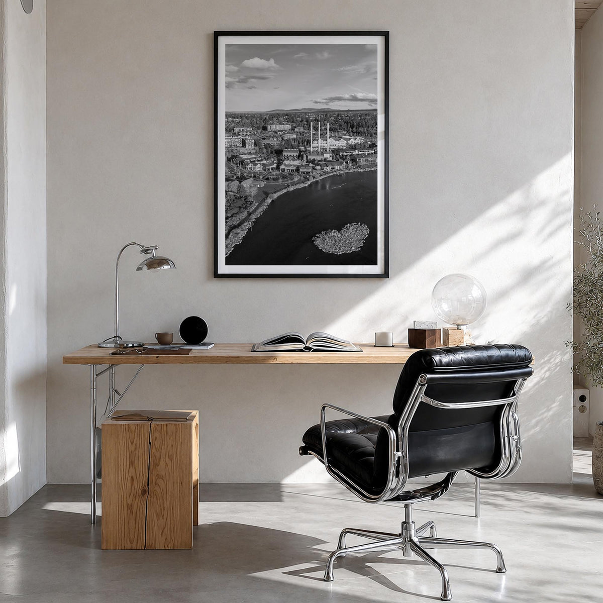 Bend black & white photo poster of Oregon, USA – vertical wall art in black wood frame with white border, hanging on wall
