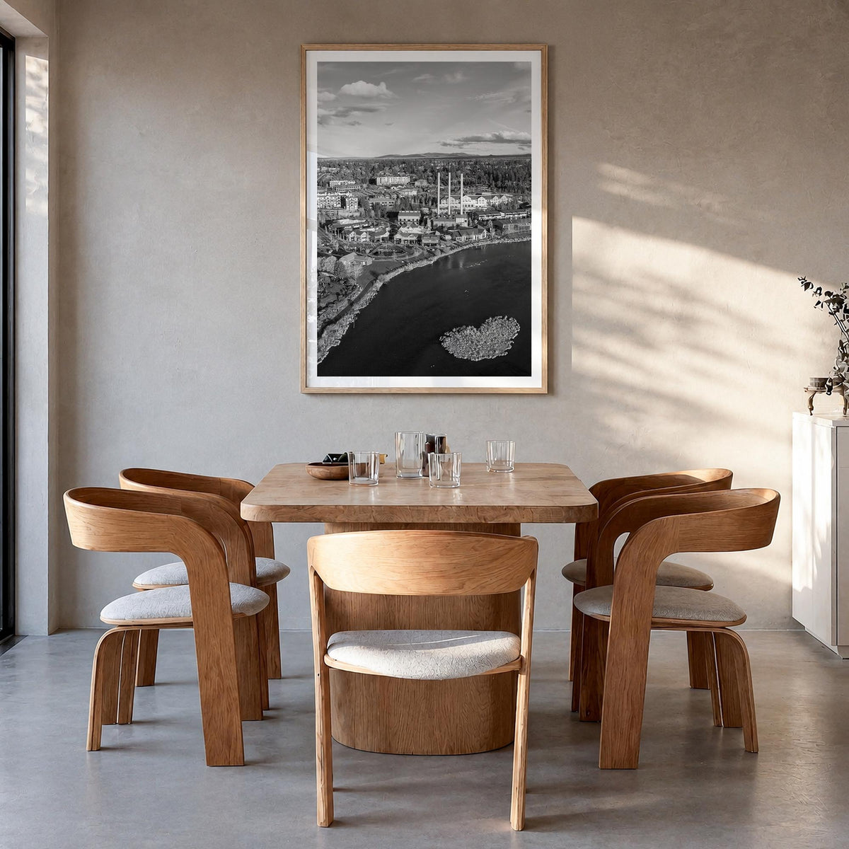 Bend black & white photo poster of Oregon, USA – vertical wall art in natural wood frame with white border, hanging on wall