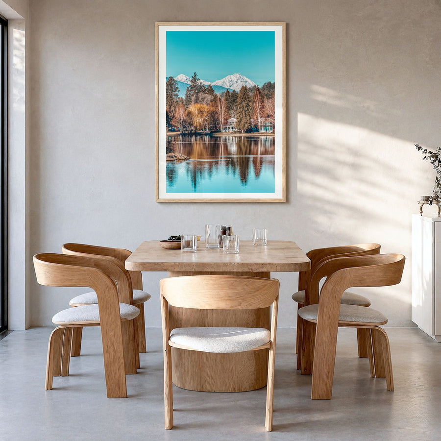 Bend Photo Poster in a natural wood frame, hanging in a dining room, white border