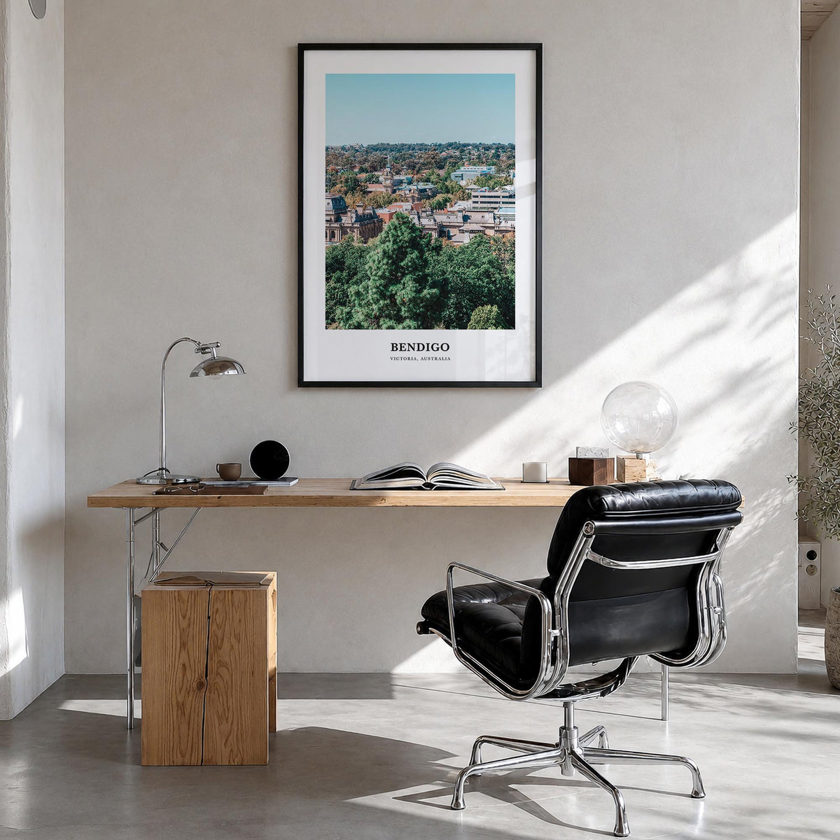 Bendigo colorful classic poster of Australia – vertical wall art in black wood frame, hanging on wall