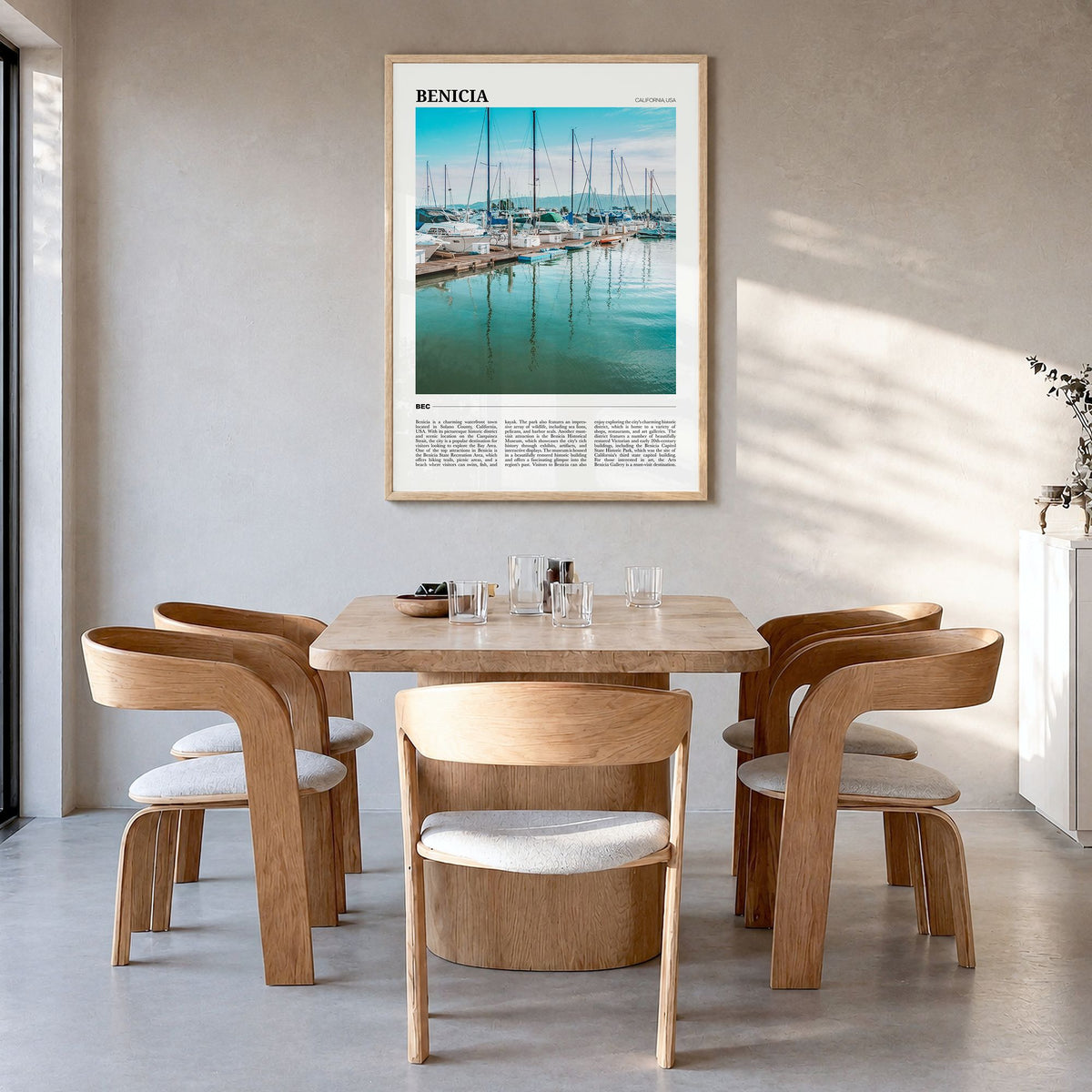 Benicia Travel Poster in a natural wood frame, hanging in a dining room