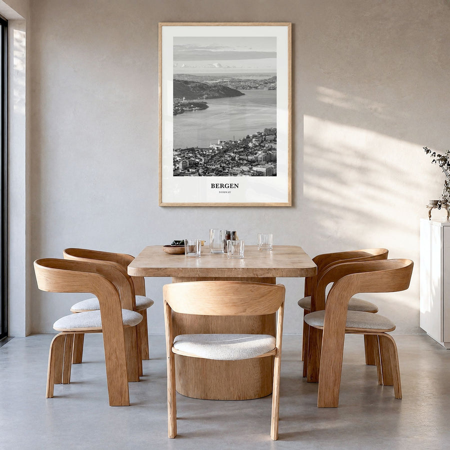 Bergen Classic Poster in a natural wood frame, hanging in a dining room