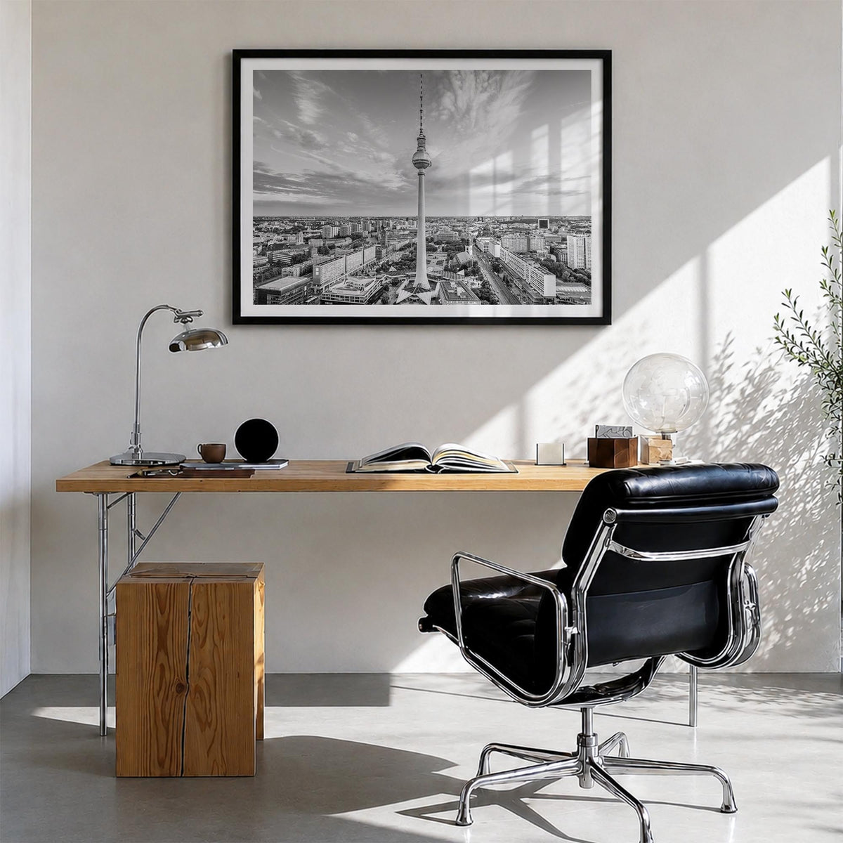 Berlin black & white photo poster of Germany – horizontal wall art in black wood frame with white border, hanging on wall