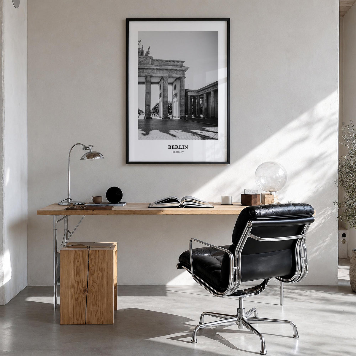 Berlin no. 2 black & white classic poster of Germany – vertical wall art in black wood frame, hanging on wall