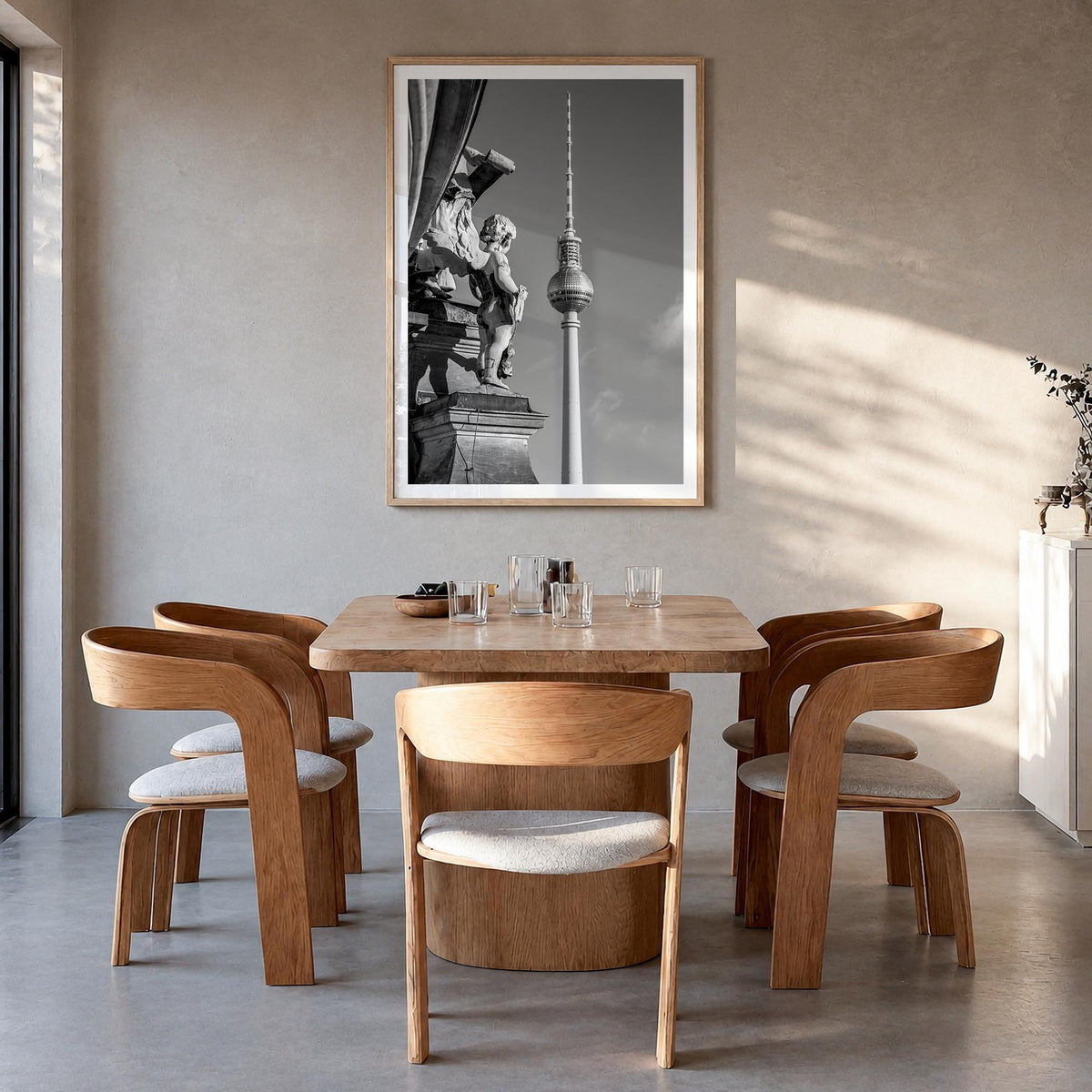 Berlin no. 3 black & white photo poster of Germany – vertical wall art in natural wood frame with white border, hanging on wa