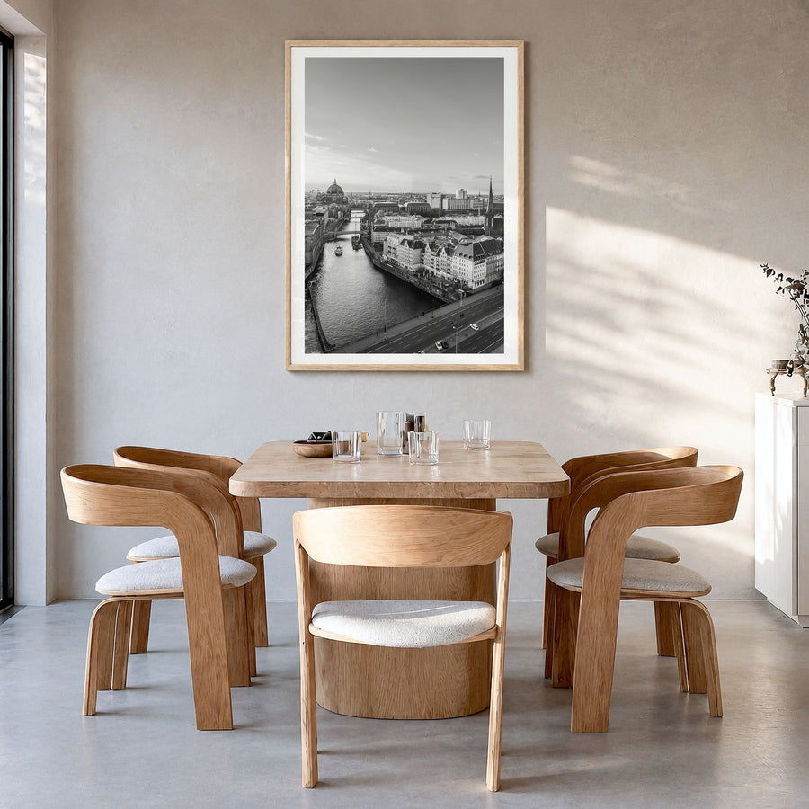 Berlin Photo No 1 Poster in a natural wood frame, hanging in a dining room, white border
