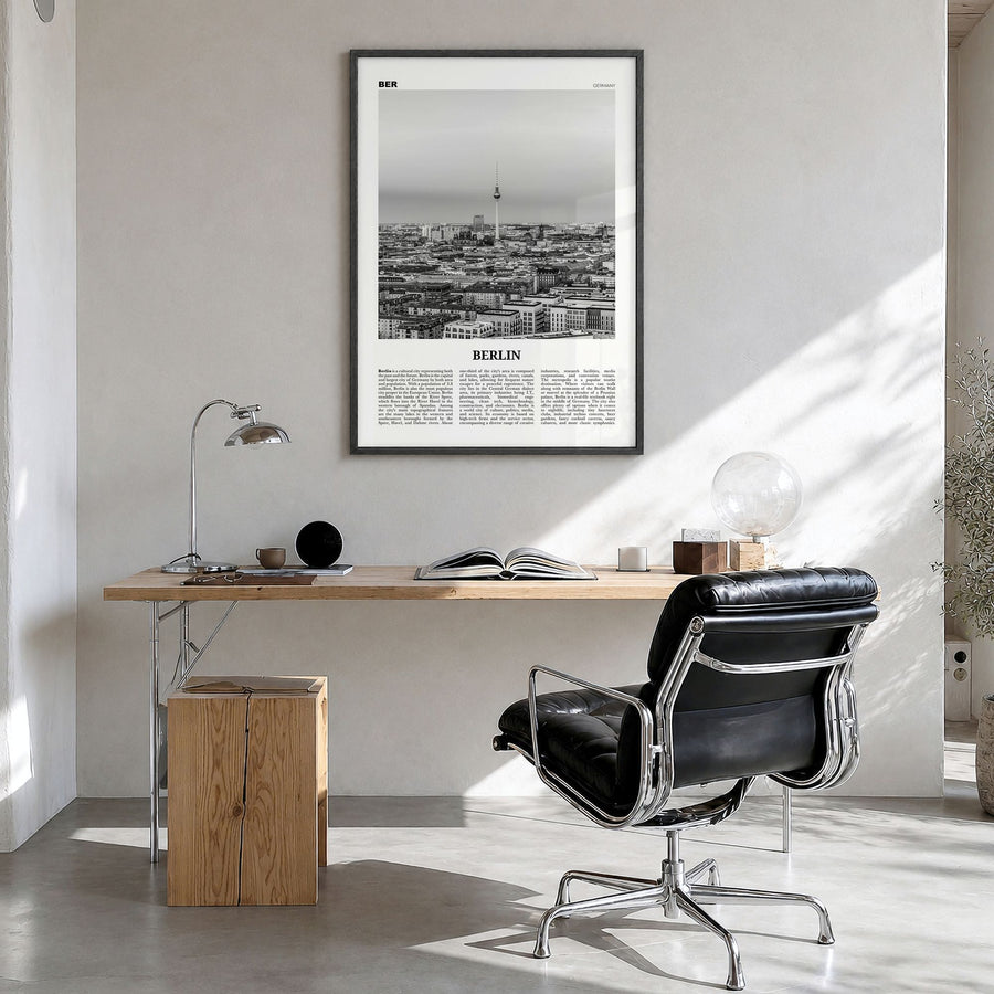 Berlin Newspaper No 2 Poster in a black wood frame, hanging in a bright home office