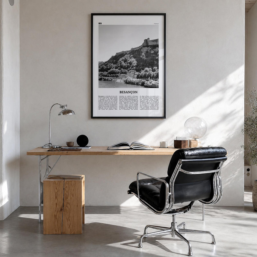 Besançon black & white newspaper poster of France – vertical wall art in black wood frame, hanging on wall