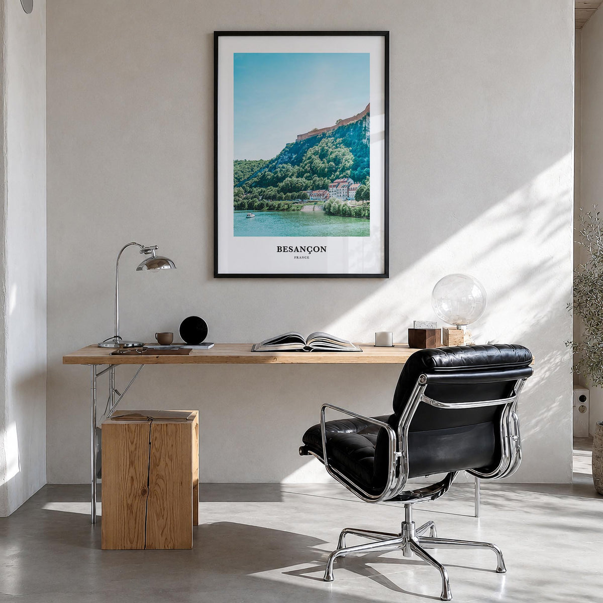 Besançon colorful classic poster of France – vertical wall art in black wood frame, hanging on wall