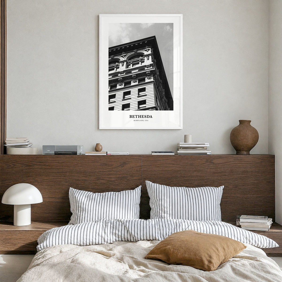 Bethesda Classic Poster in a white wood frame, hanging in a bedroom
