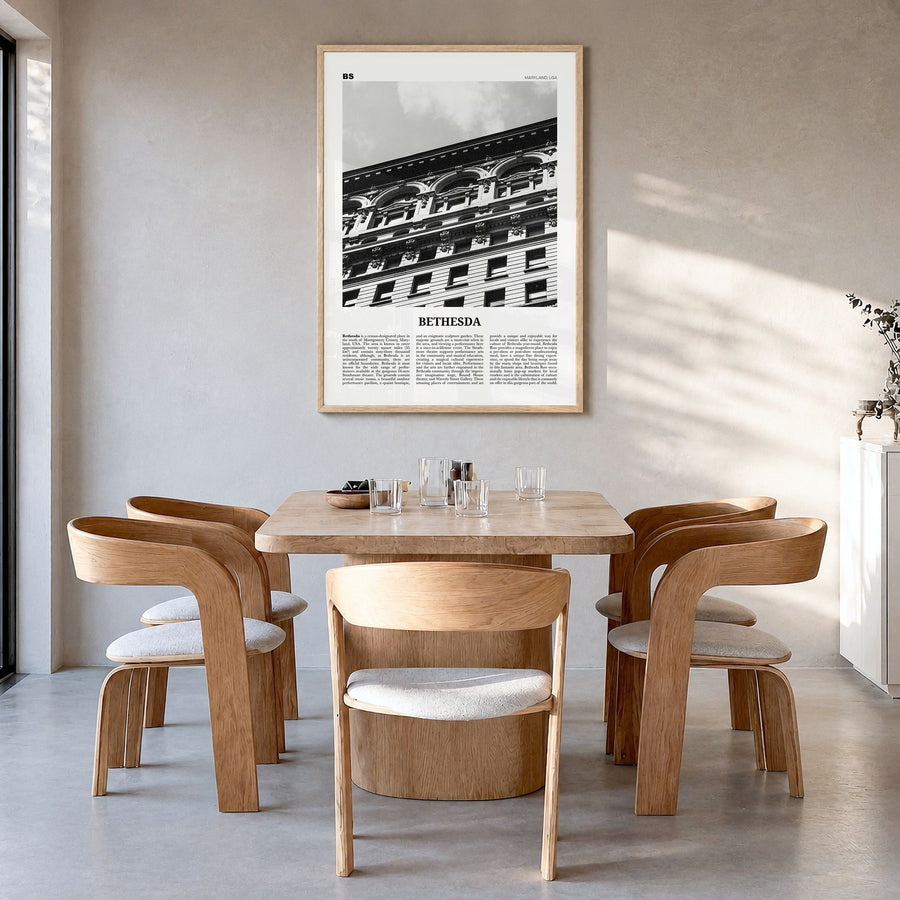 Bethesda Newspaper Poster in a natural wood frame, hanging in a dining room