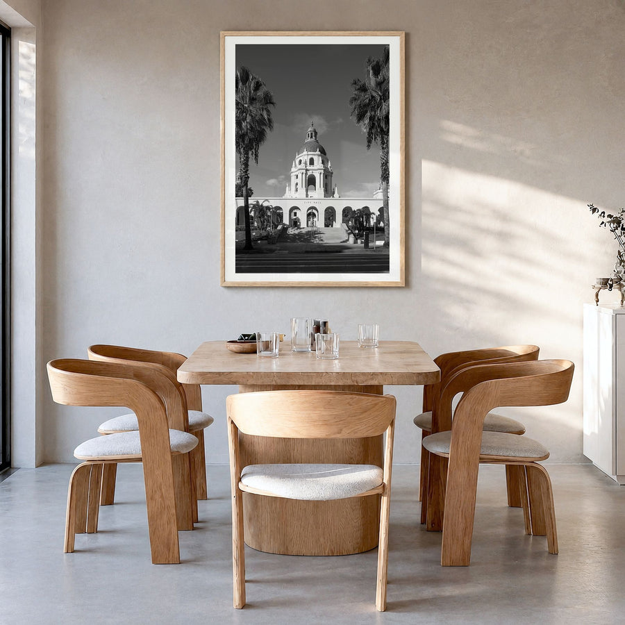 Beverly Hills Photo Poster in a natural wood frame, hanging in a dining room, white border