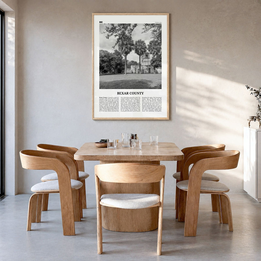 Bexar County Newspaper Poster in a natural wood frame, hanging in a dining room