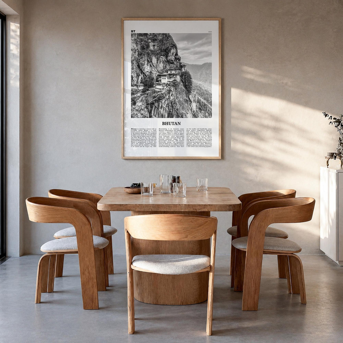 Bhutan black & white newspaper poster of Asia – vertical wall art in natural wood frame, hanging on wall