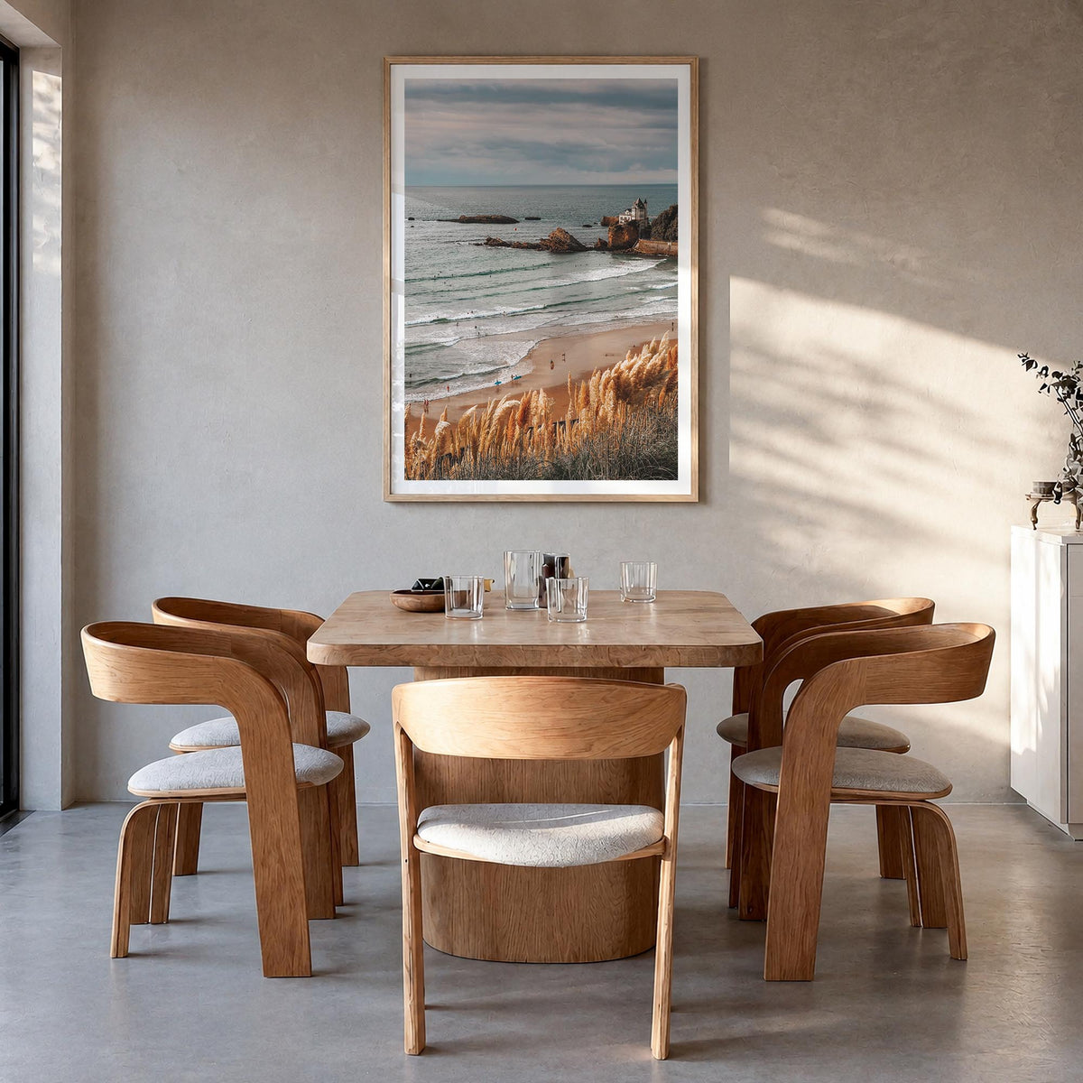 Biarritz colorful photo poster of France – vertical wall art in natural wood frame with white border, hanging on wall