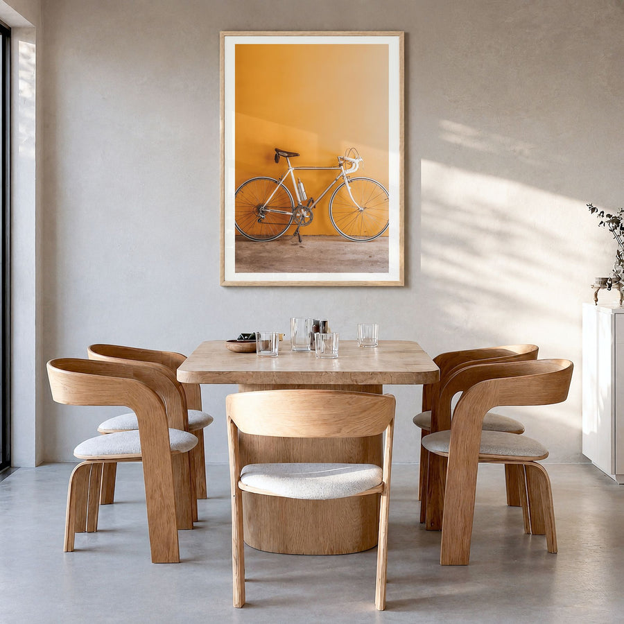 Bicycle Photo No 1 Poster in a natural wood frame, hanging in a dining room, white border