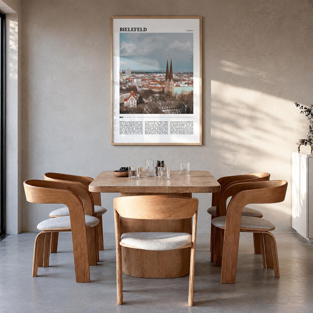 Bielefeld colorful travel poster of Germany – vertical wall art in natural wood frame, hanging on wall