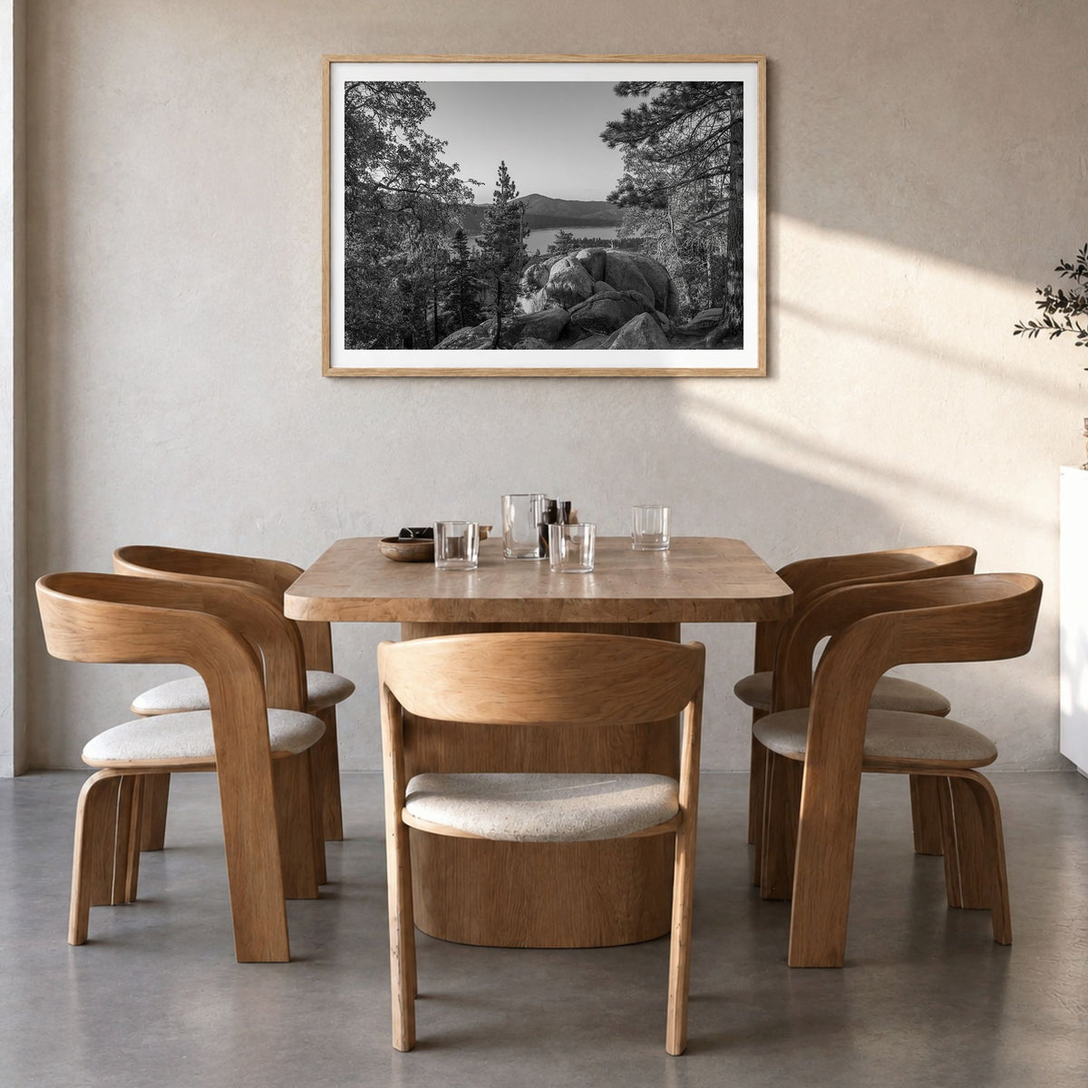 Big Bear Lake Photo Poster in a natural wood frame, hanging in a dining room, white border