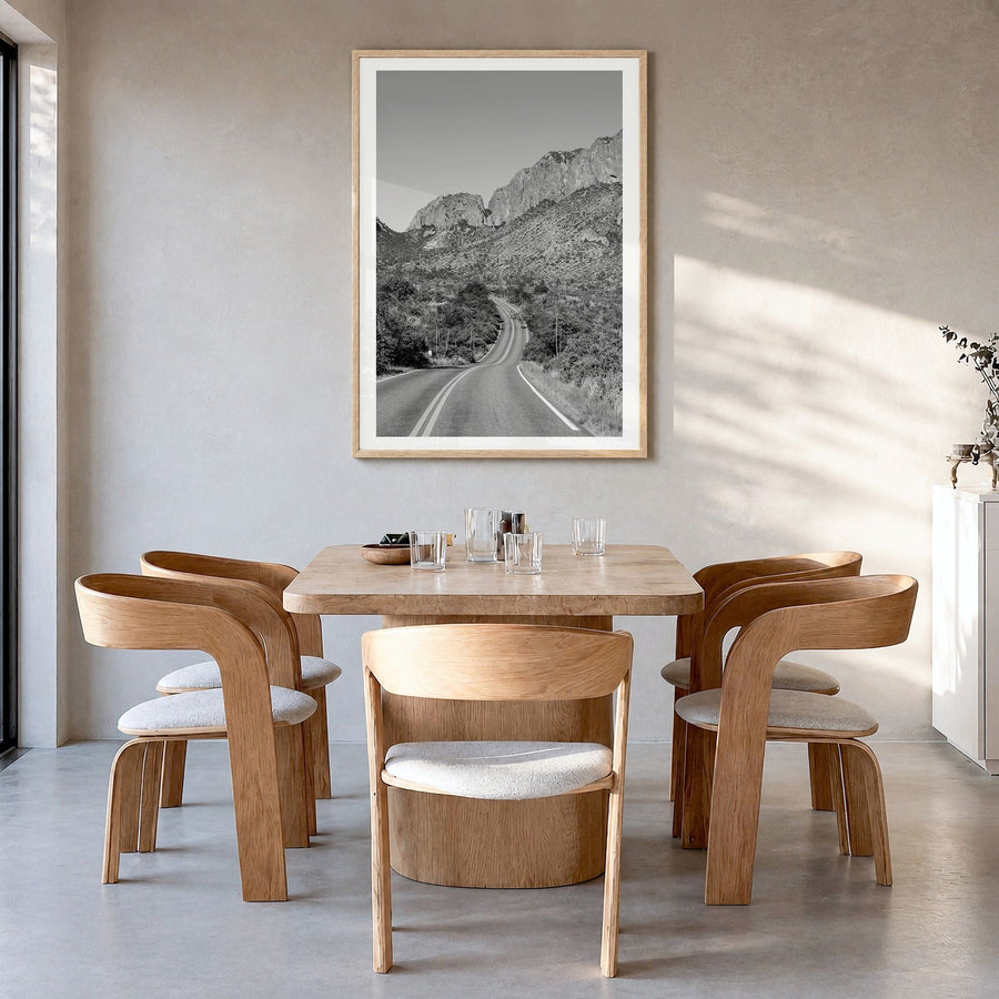 Big Bend National Park Photo Poster in a natural wood frame, hanging in a dining room, white border