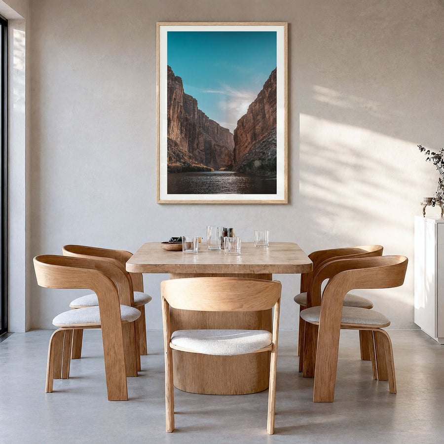 Big Bend National Park Photo Poster in a natural wood frame, hanging in a dining room, white border