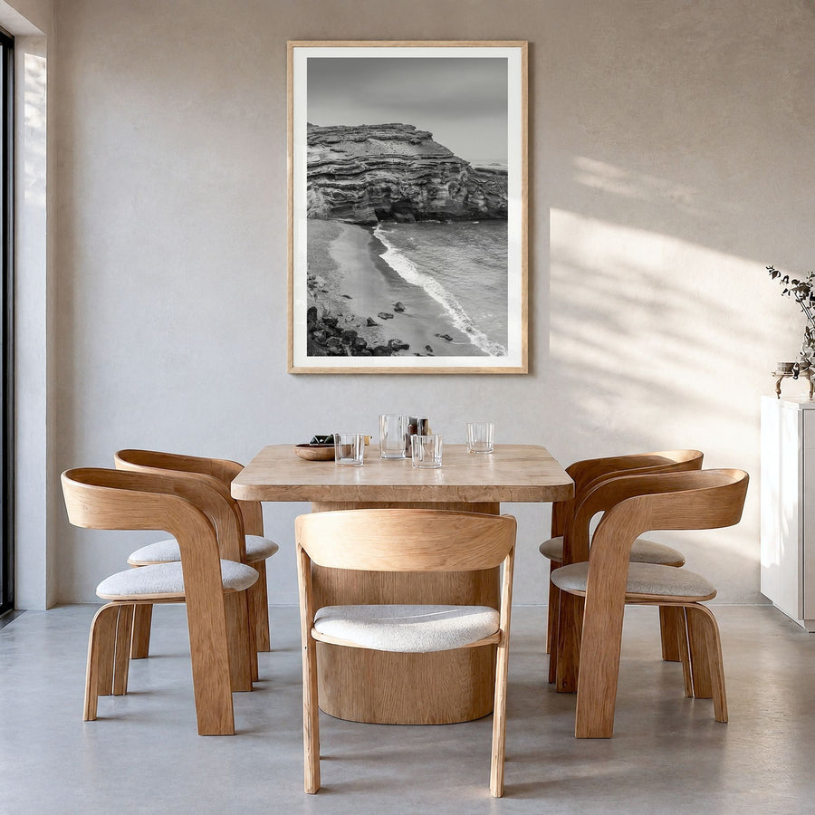 Big Island Photo Poster in a natural wood frame, hanging in a dining room, white border