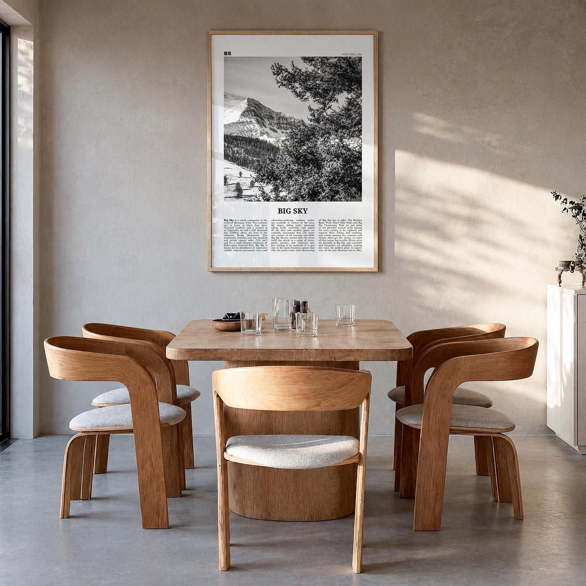 Big Sky black & white newspaper poster of Montana, USA – vertical wall art in natural wood frame, hanging on wall