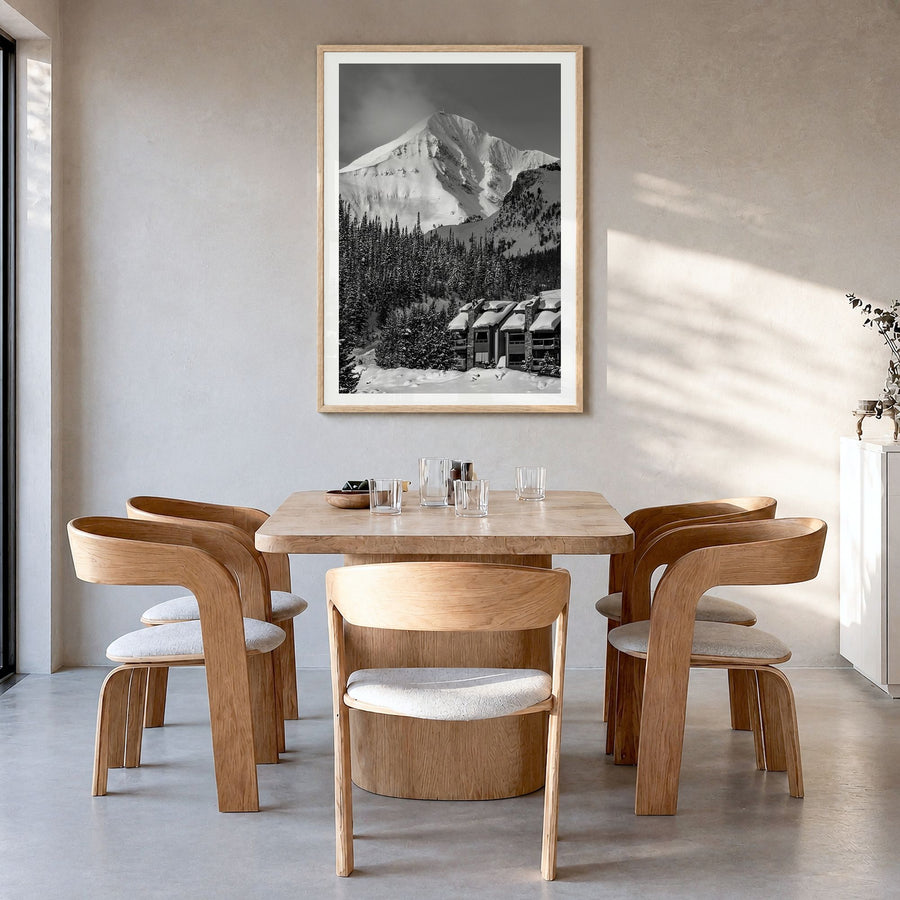 Big Sky Photo No 1 Poster in a natural wood frame, hanging in a dining room, white border