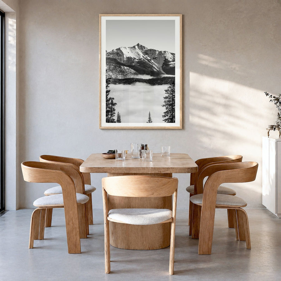 Big Sky Photo No 2 Poster in a natural wood frame, hanging in a dining room, white border