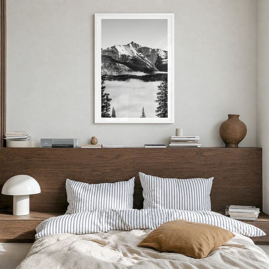 Big Sky Photo No 2 Poster in a white wood frame, hanging in a bedroom, white border