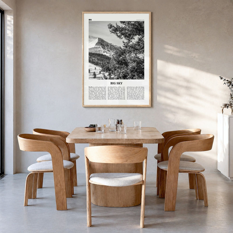 Big Sky Newspaper Poster in a natural wood frame, hanging in a dining room
