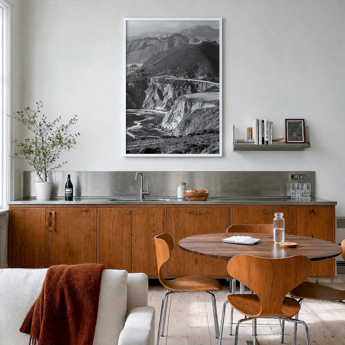 Big Sur no. 1 black & white photo poster of California, USA – vertical wall art in white wood frame, hanging on wall