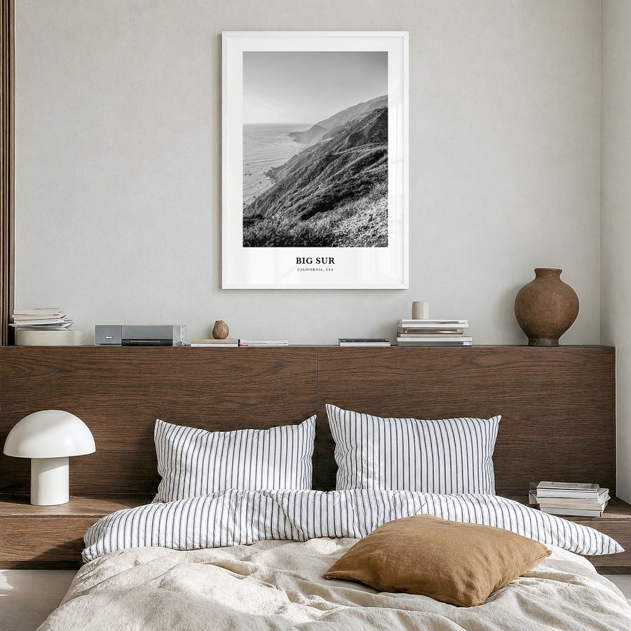 Big Sur Classic No 1 Poster in a white wood frame, hanging in a bedroom