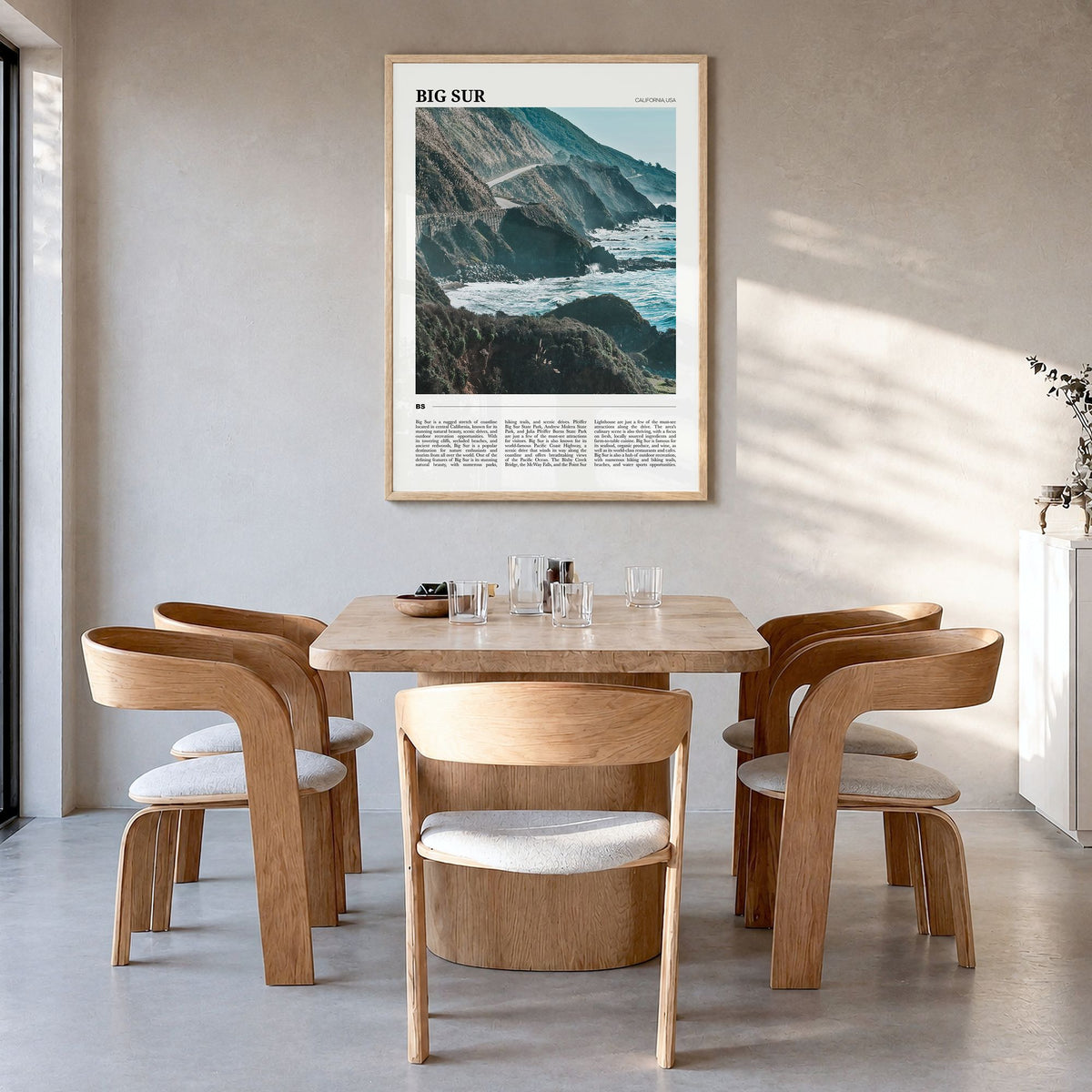 Big Sur Travel No 2 Poster in a natural wood frame, hanging in a dining room