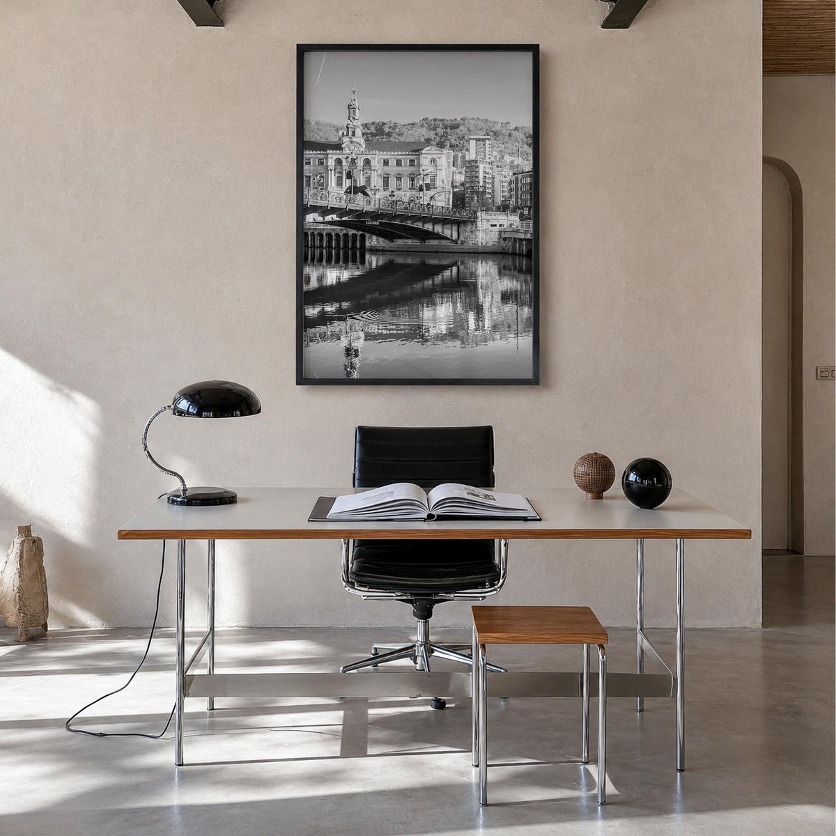 Bilbao black & white photo poster of Spain – vertical wall art in black wood frame, hanging on wall