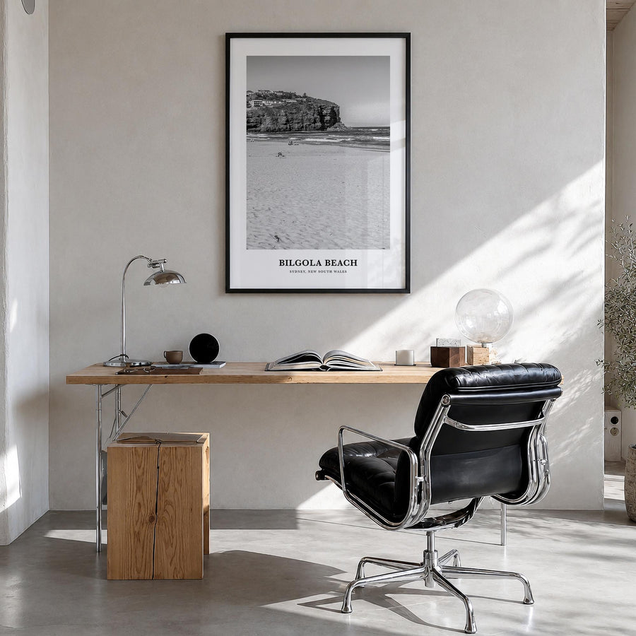 Bilgola Beach black & white classic poster of Australia – vertical wall art in black wood frame, hanging on wall