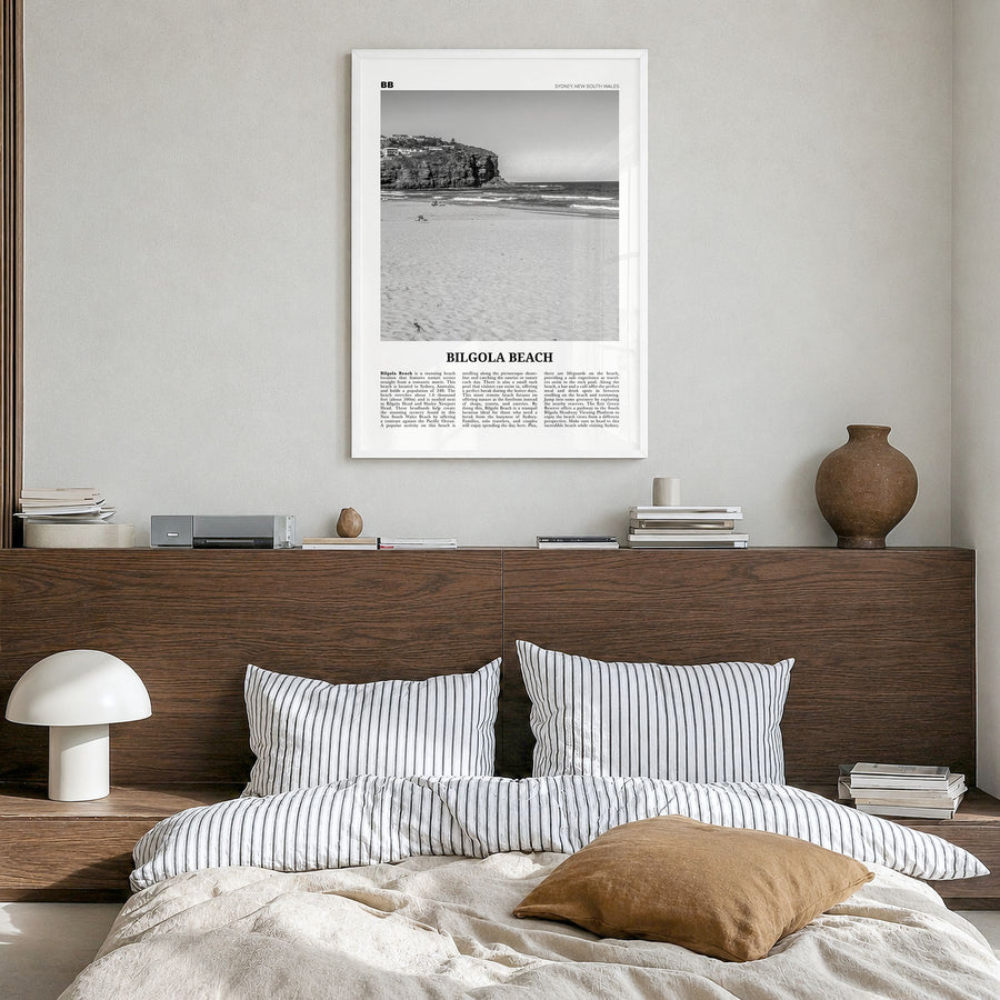 Bilgola Beach Newspaper Poster in a white wood frame, hanging in a bedroom