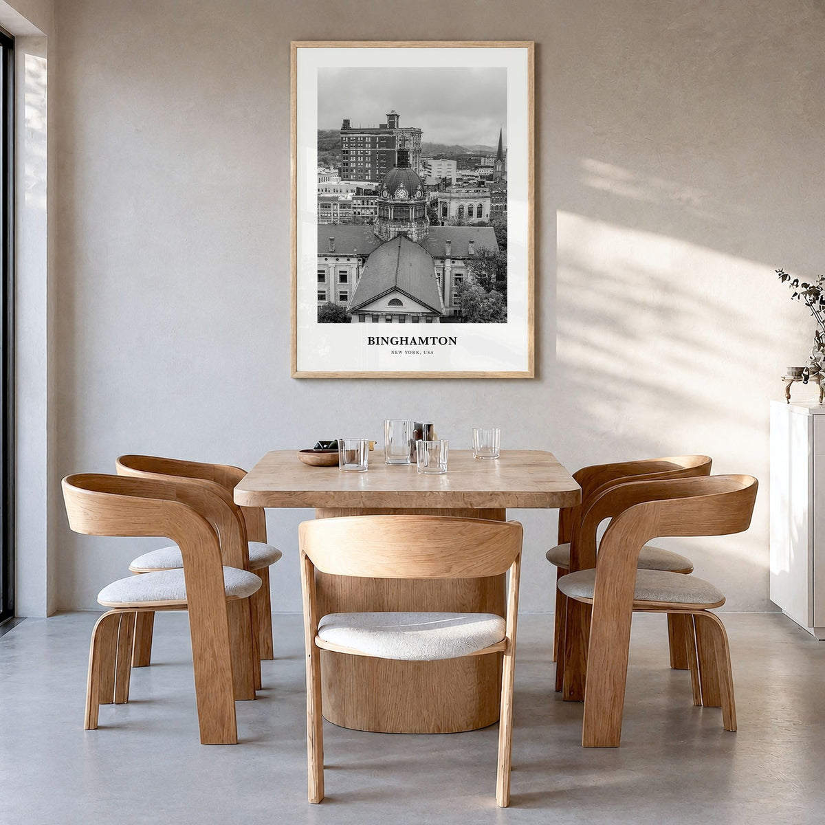 Binghamton Classic Poster in a natural wood frame, hanging in a dining room