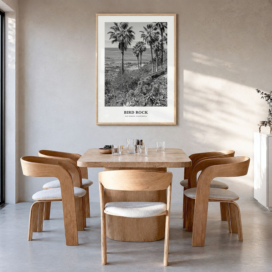 Bird Rock Classic No 1 Poster in a natural wood frame, hanging in a dining room