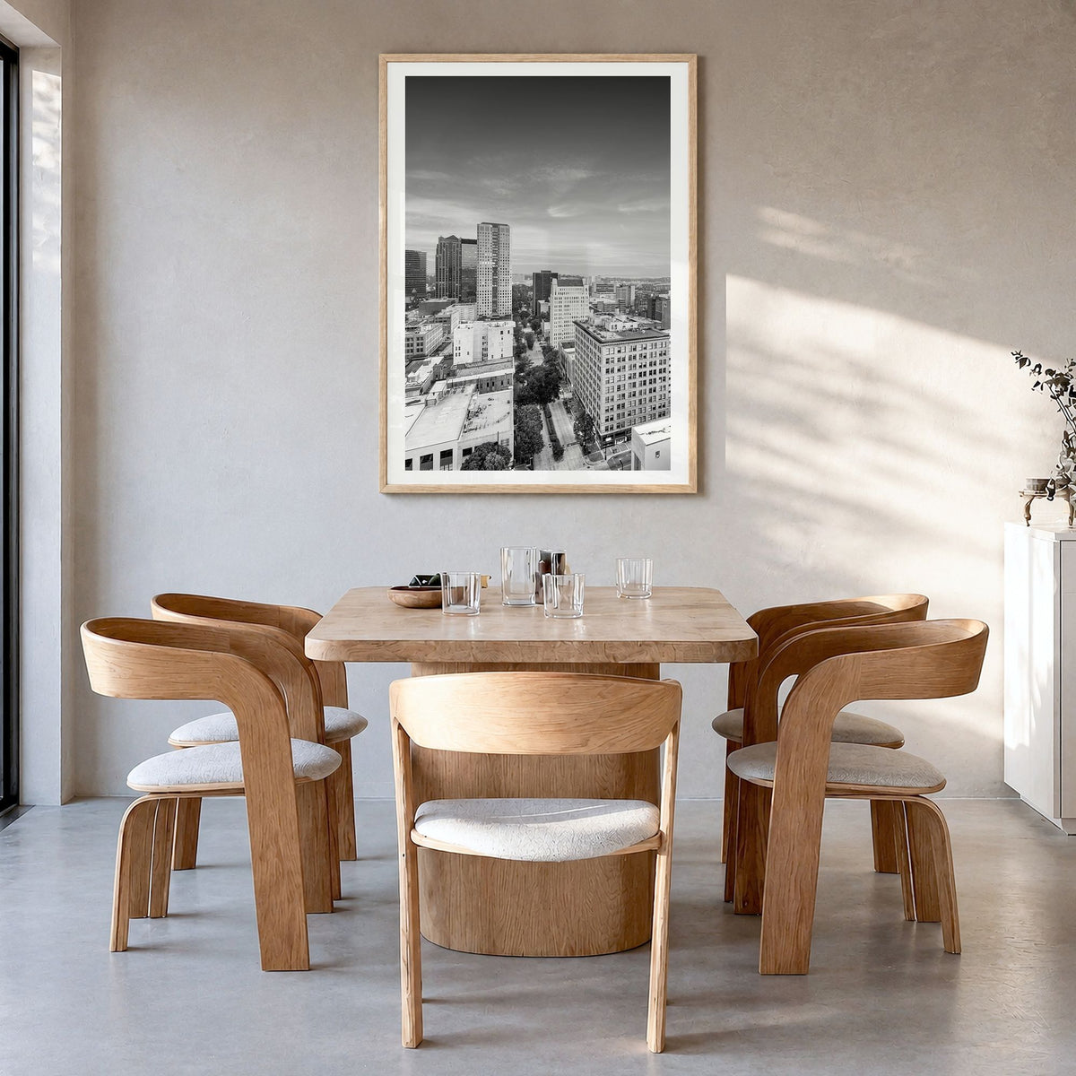 Birmingham, Alabama Photo Poster in a natural wood frame, hanging in a dining room, white border