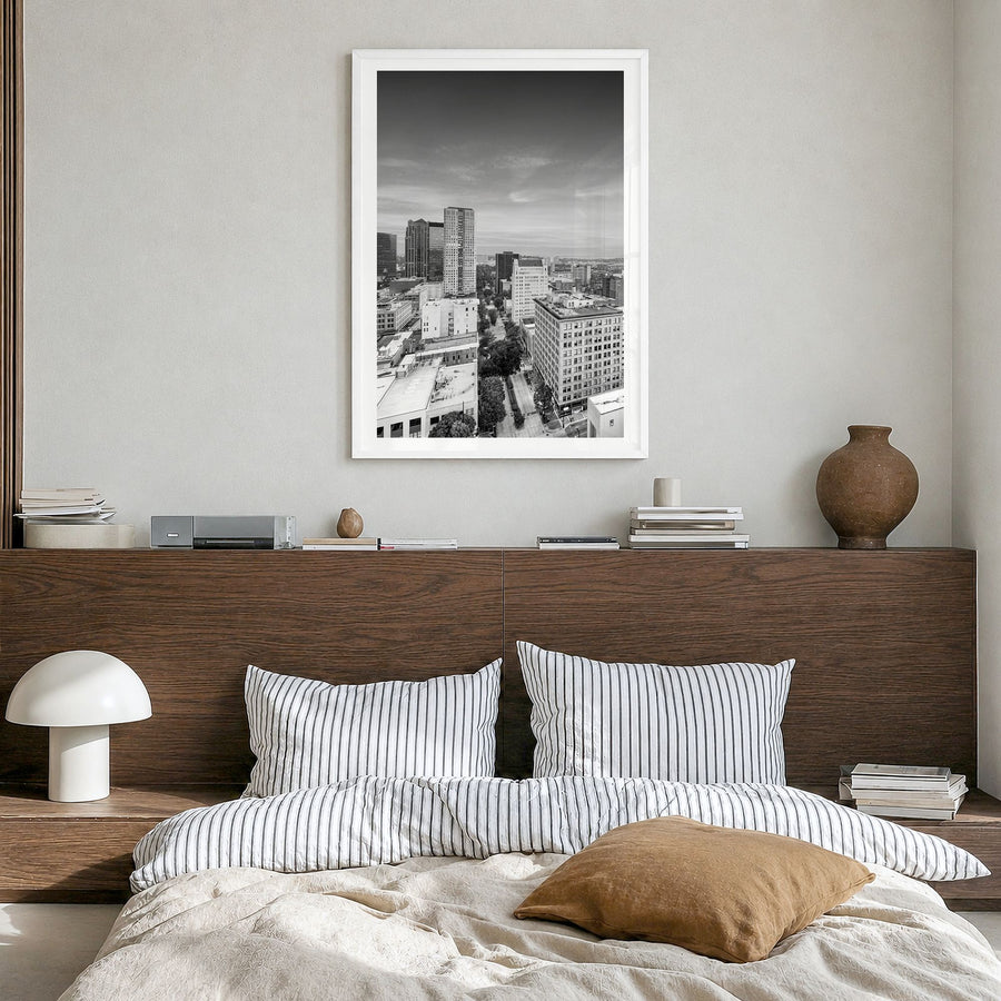 Birmingham, Alabama Photo Poster in a white wood frame, hanging in a bedroom, white border