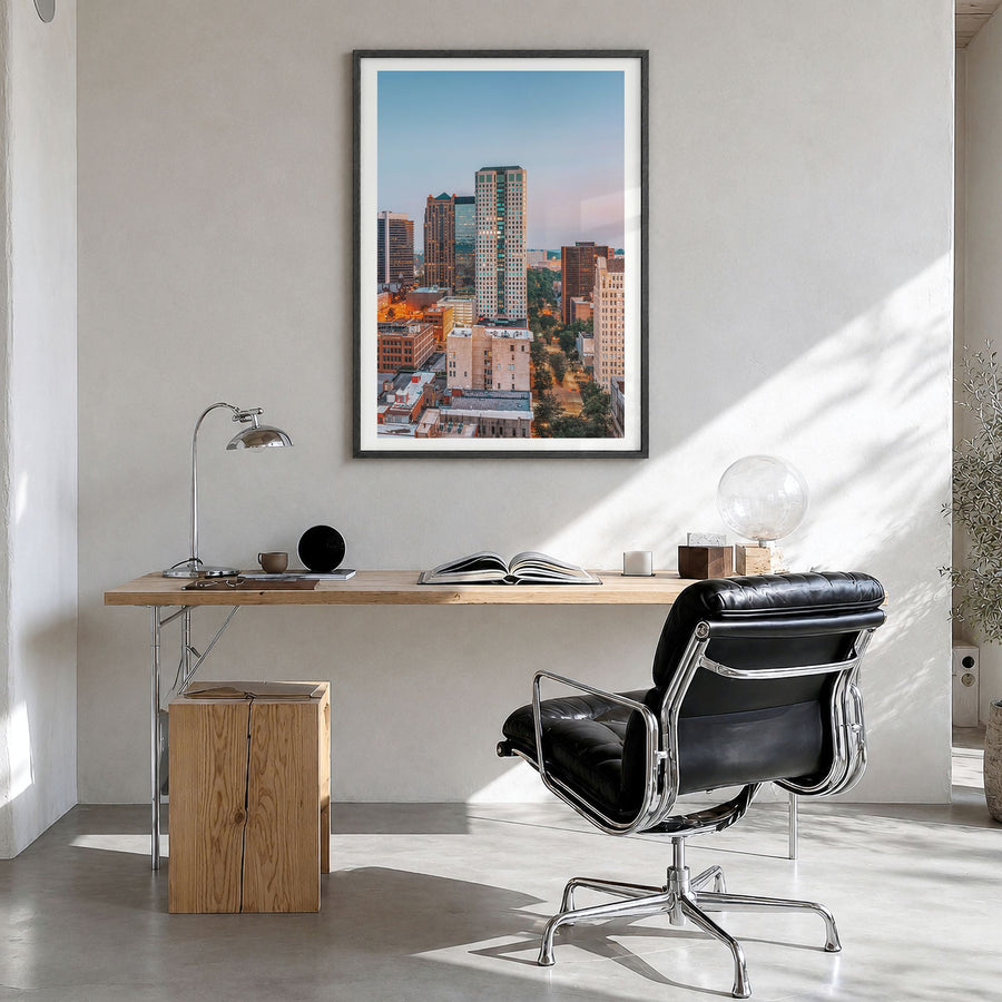 Birmingham, Alabama Photo Poster in a black wood frame, hanging in a bright home office, white border