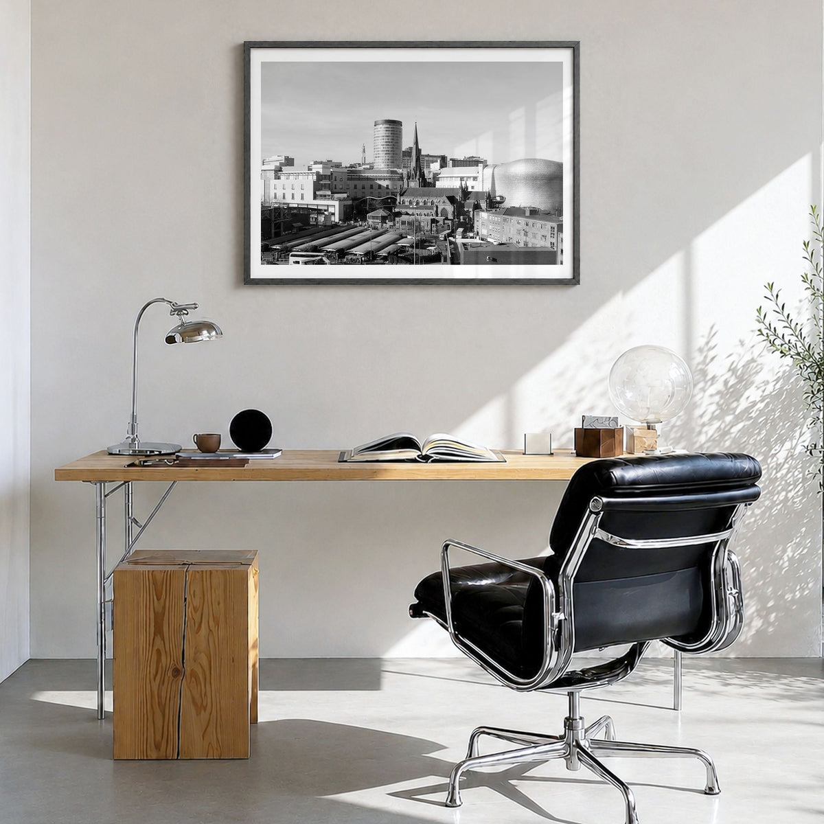 Birmingham, England Photo Poster in a black wood frame, hanging in a bright home office, white border