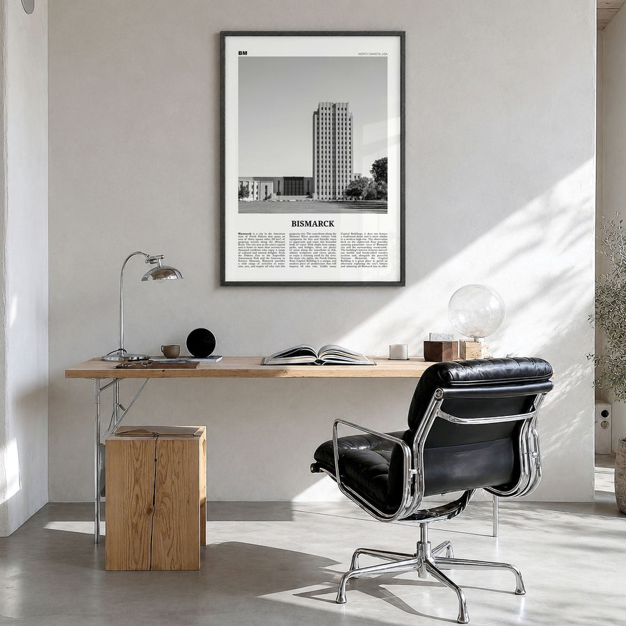 Bismarck Newspaper Poster in a black wood frame, hanging in a bright home office